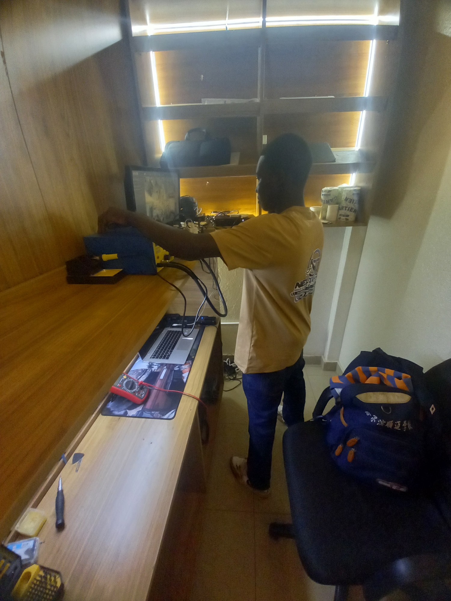 I.T. Lionel working at the Neltech technical bench